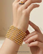 Gilded Dual Tone Dewdrop Bangles