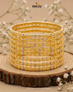 Gilded Dual Tone Dewdrop Bangles