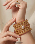 Ornate Petal Medallion Bangles
